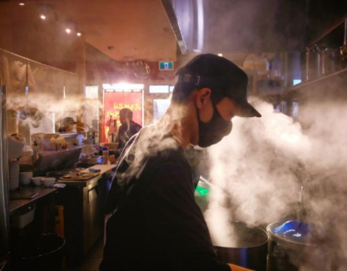 cook in a steamy kitchen